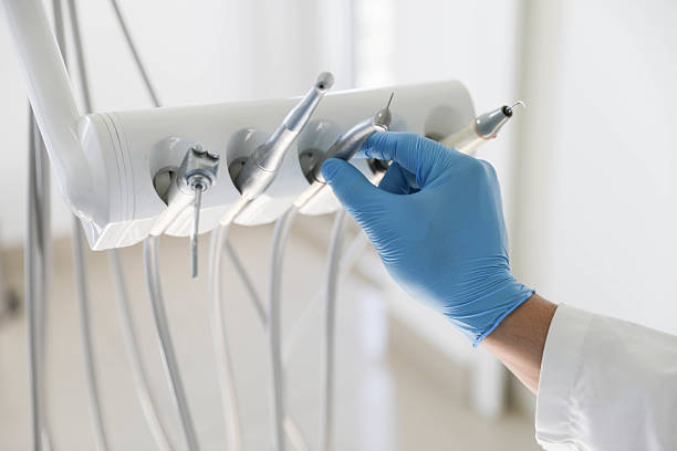 Professional Tooth Extraction technician working in Ridgeland, MS